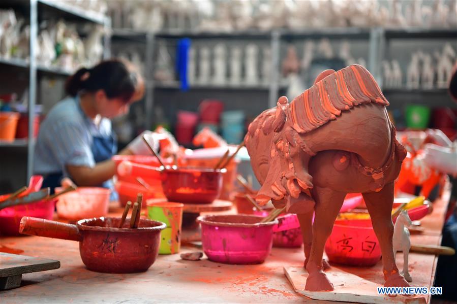 CHINA-HENAN-ART-TRI-COLORED GLAZED POTTERY-TECHNIQUE (CN)