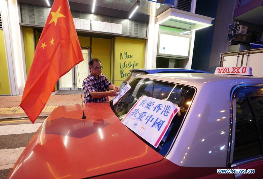 CHINA-HONG KONG-TAXIS RALLY-CALLING FOR PEACE (CN)