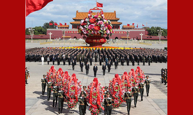 Chinese leaders pay tribute to national heroes at Tian'anmen Square