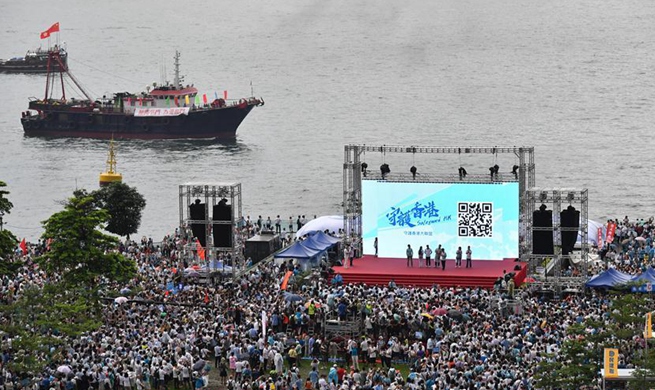 Residents of China's Hong Kong rally to appeal for peace, stability