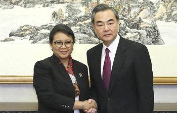 Chinese FM meets Indonesian, Greek counterparts in Beijing