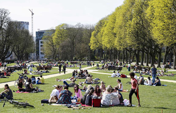 People enjoy sunshine as temperature rise in Brussels